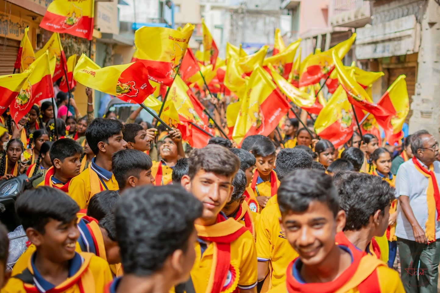 School students marching with Kannada flags held high during the 2023 flag march